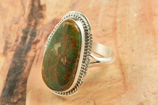 Genuine Royston Turquoise Stone set in Sterling Silver Ring. The Royston Turquoise Mine is located in Nye County, Nevada. Created by Navajo Artist Larson Lee.